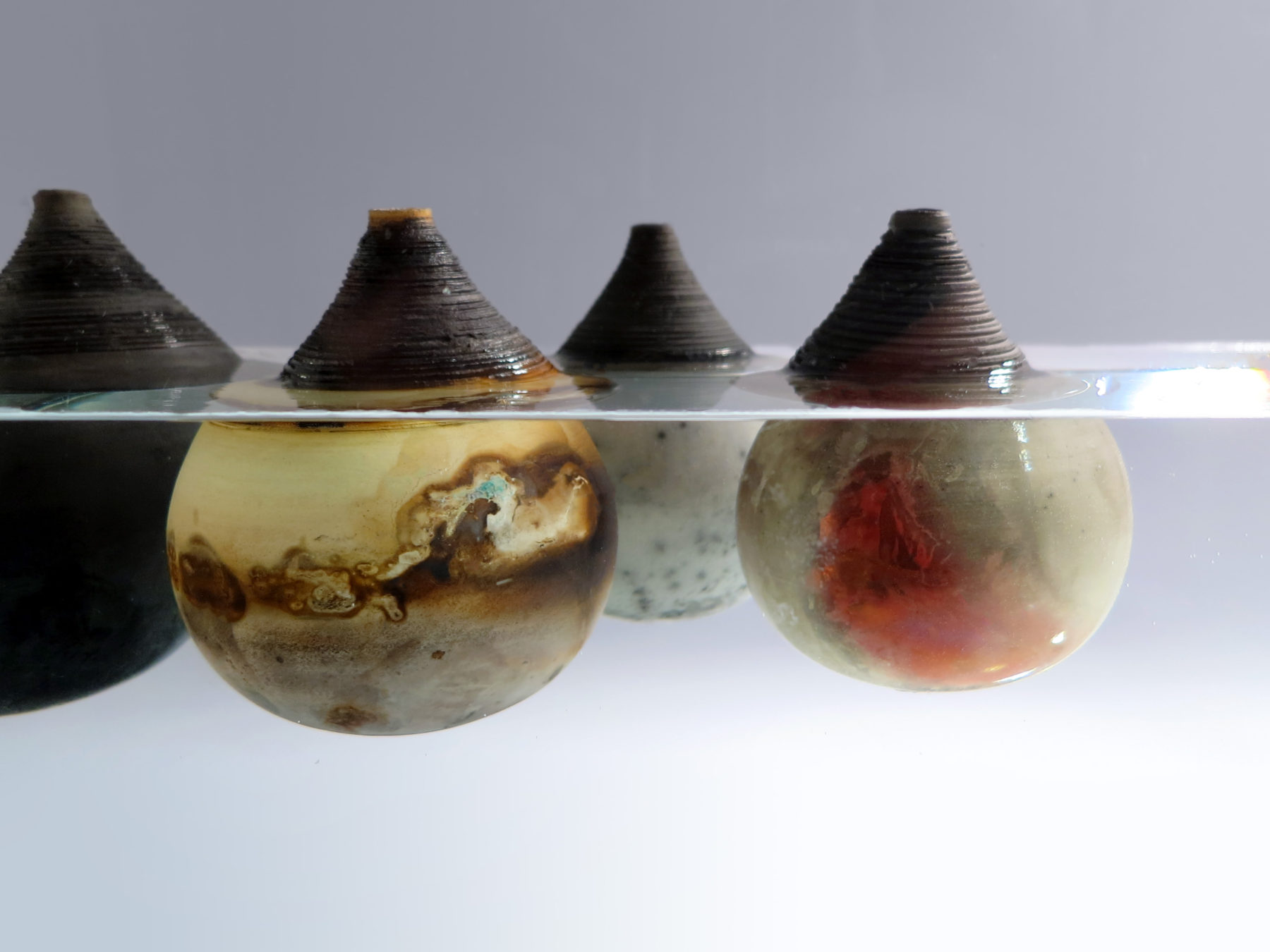 Under the Surface: Whispering Globes - Ildikó Károlyi