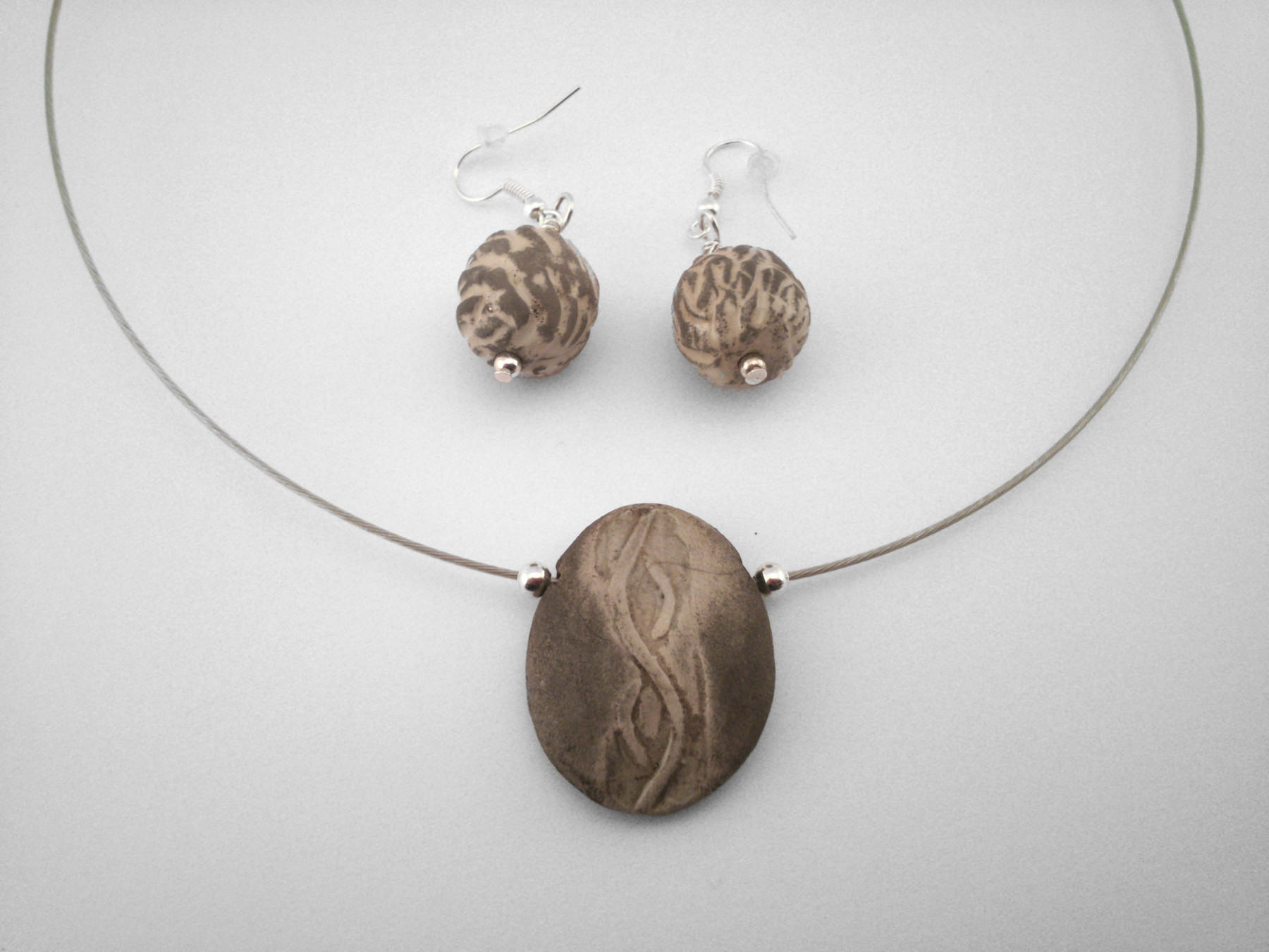 Pebble Medal and Pendants - Ildikó Károlyi